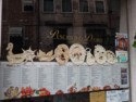 Restaurant window decorated with bread figures